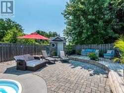 Patios and raised curved decks to provide seating in the sun or the shade. - 