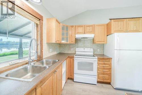 5474 Tatton Station Road, 100 Mile House, BC - Indoor Photo Showing Kitchen With Double Sink