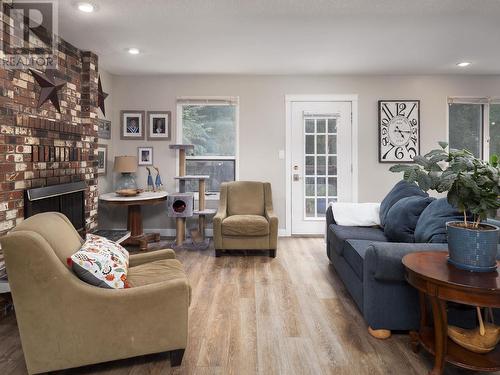 8025 Newcastle Crescent, Prince George, BC - Indoor Photo Showing Living Room With Fireplace