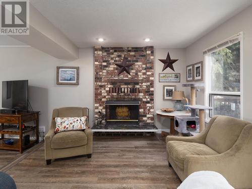 8025 Newcastle Crescent, Prince George, BC - Indoor Photo Showing Living Room With Fireplace