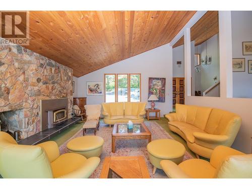 9653 Whitepoint Road, Vernon, BC - Indoor Photo Showing Living Room With Fireplace