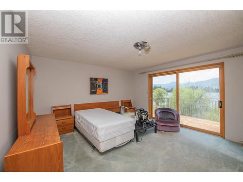 9653 Whitepoint Road, Vernon, BC - Indoor Photo Showing Bedroom