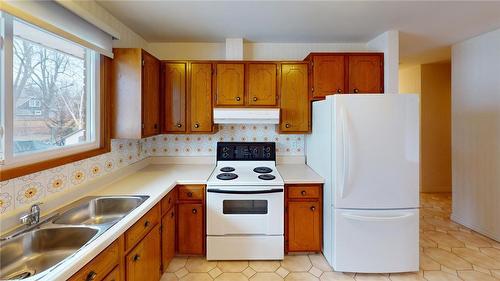 11 Karen Avenue, St. Catharines, ON - Indoor Photo Showing Kitchen With Double Sink