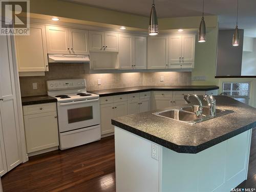 1313 Heidgerken Crescent, Humboldt, SK - Indoor Photo Showing Kitchen With Double Sink