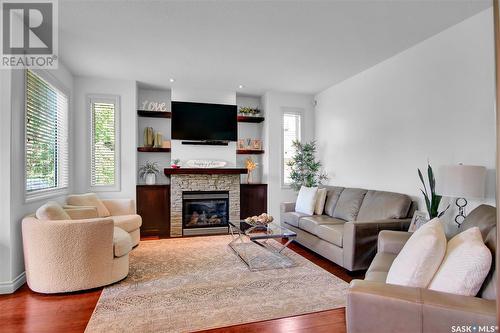 45 Emerald Creek Drive, White City, SK - Indoor Photo Showing Living Room With Fireplace