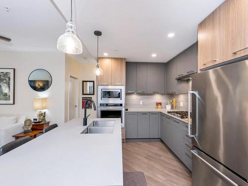 104-960 Reunion Ave, Langford, BC - Indoor Photo Showing Kitchen With Stainless Steel Kitchen With Double Sink With Upgraded Kitchen