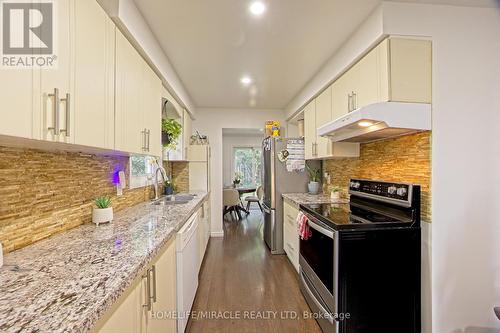 23 Moselle Drive, Toronto (West Humber-Clairville), ON - Indoor Photo Showing Kitchen With Double Sink With Upgraded Kitchen