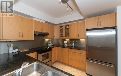 401 - 3 Mcalpine Street, Toronto (Annex), ON - Indoor Photo Showing Kitchen With Stainless Steel Kitchen With Double Sink