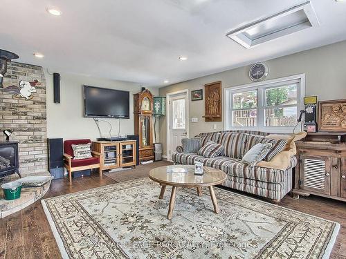 228 Bayshore Rd E, Innisfil, ON - Indoor Photo Showing Living Room With Fireplace