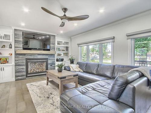 228 Bayshore Rd E, Innisfil, ON - Indoor Photo Showing Living Room With Fireplace