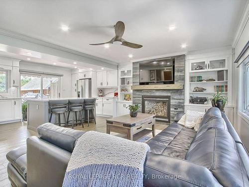 228 Bayshore Rd E, Innisfil, ON - Indoor Photo Showing Living Room With Fireplace