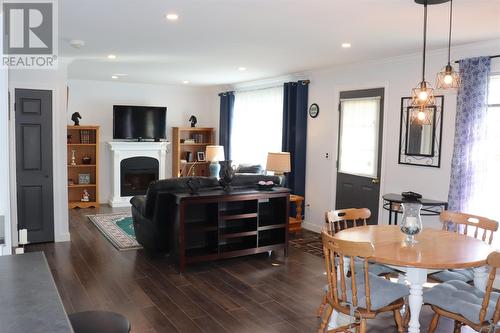 32 Main Road, Westbay, NL - Indoor Photo Showing Dining Room With Fireplace