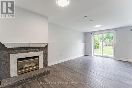 Lower - 378 Sekura Street, Cambridge, ON - Indoor Photo Showing Living Room With Fireplace