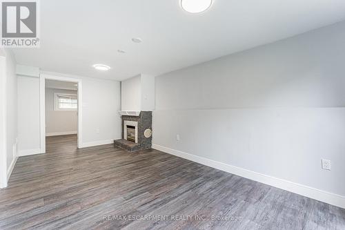 Lower - 378 Sekura Street, Cambridge, ON - Indoor Photo Showing Other Room With Fireplace