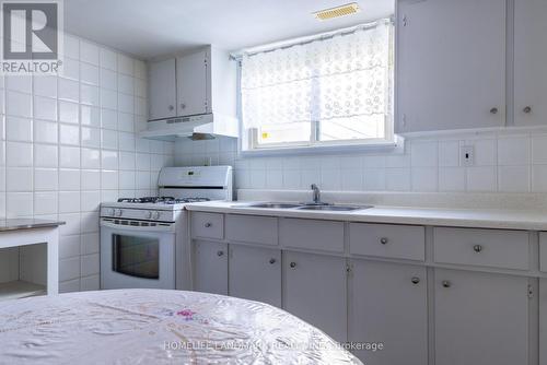 6776 Margaret Street, Niagara Falls, ON - Indoor Photo Showing Kitchen With Double Sink