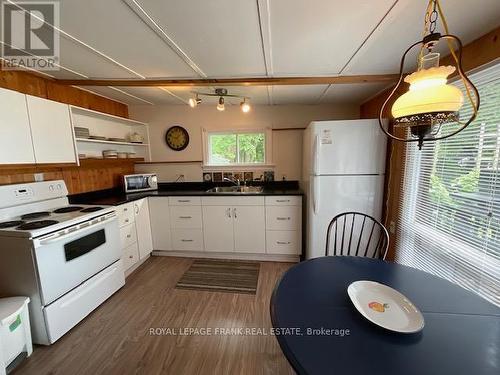 16 Caline Road, Curve Lake First Nation 35 (Curve Lake First Nation), ON - Indoor Photo Showing Kitchen With Double Sink