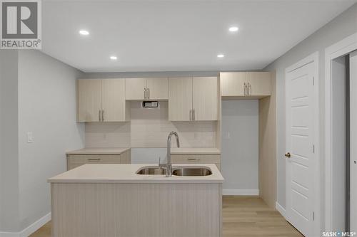 243 St John Street, Regina, SK - Indoor Photo Showing Kitchen With Double Sink