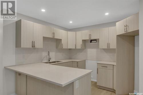 243 St John Street, Regina, SK - Indoor Photo Showing Kitchen With Double Sink