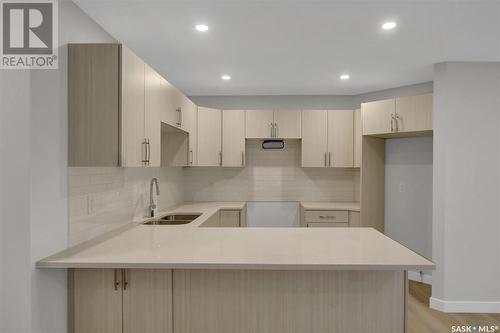 243 St John Street, Regina, SK - Indoor Photo Showing Kitchen With Double Sink