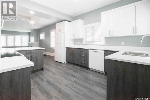 3715 Victoria Avenue, Regina, SK - Indoor Photo Showing Kitchen With Double Sink