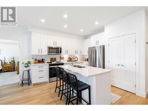 3434 Mckinley Beach Drive Unit# 407, Kelowna, BC - Indoor Photo Showing Kitchen With Double Sink With Upgraded Kitchen