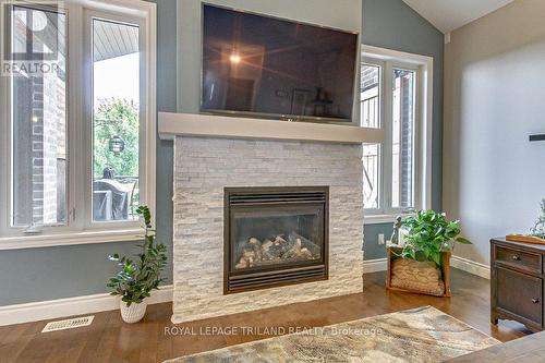 233 Wedgewood Drive E, Woodstock, ON - Indoor Photo Showing Living Room With Fireplace