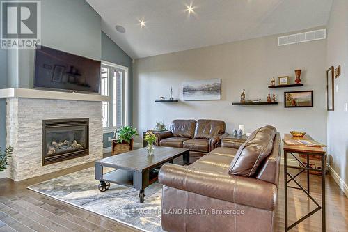 233 Wedgewood Drive E, Woodstock, ON - Indoor Photo Showing Living Room With Fireplace