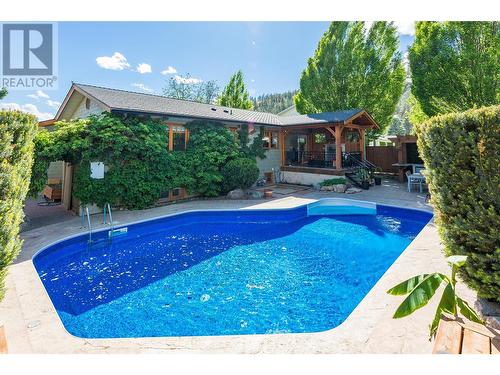 306 Yates Road, Kelowna, BC - Outdoor With In Ground Pool With Deck Patio Veranda With Backyard