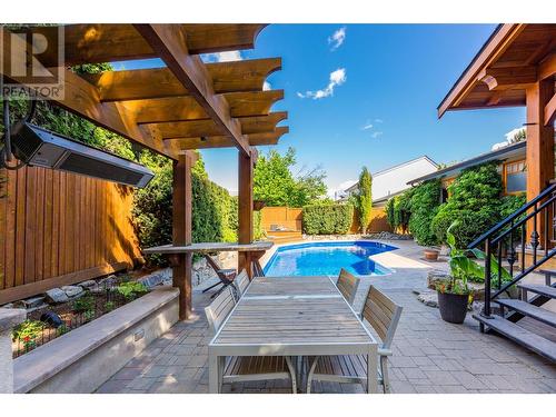 306 Yates Road, Kelowna, BC - Outdoor With In Ground Pool With Deck Patio Veranda With Exterior