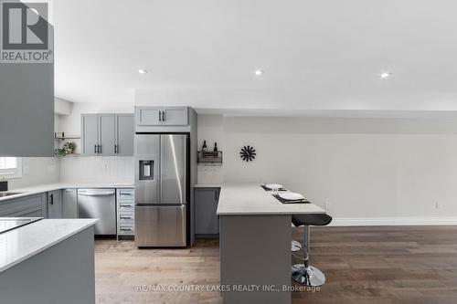 22 - 100 Laguna Parkway, Ramara (Brechin), ON - Indoor Photo Showing Kitchen