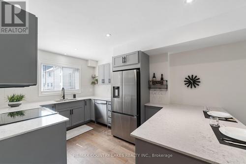 22 - 100 Laguna Parkway, Ramara (Brechin), ON - Indoor Photo Showing Kitchen