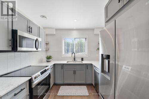 22 - 100 Laguna Parkway, Ramara (Brechin), ON - Indoor Photo Showing Kitchen With Upgraded Kitchen