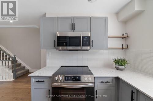 22 - 100 Laguna Parkway, Ramara (Brechin), ON - Indoor Photo Showing Kitchen