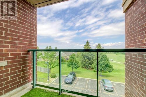 317 - 55 Via Rosedale, Brampton (Sandringham-Wellington), ON - Outdoor With Balcony With Exterior