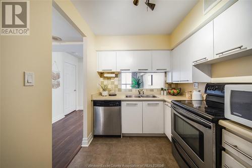 75 Riverside Drive East Unit# 901, Windsor, ON - Indoor Photo Showing Kitchen With Double Sink