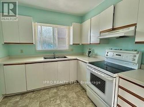 24 - 65 Dorchester Boulevard, St. Catharines, ON - Indoor Photo Showing Kitchen With Double Sink