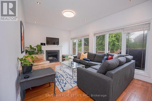 656 Geneva Street N, St. Catharines, ON - Indoor Photo Showing Living Room With Fireplace