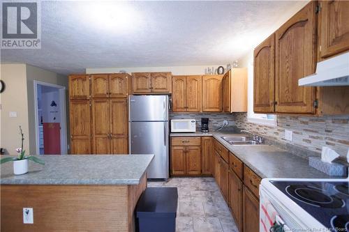 49 Riviera Street, Dsl De Drummond/Dsl Of Drummond, NB - Indoor Photo Showing Kitchen With Double Sink