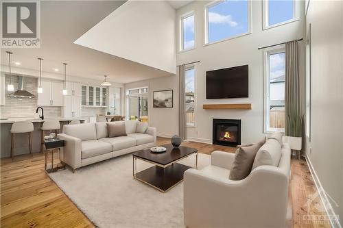 Virtually Staged - 899 Cologne Street, Embrun, ON - Indoor Photo Showing Living Room With Fireplace