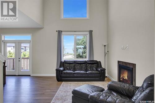 5389 Mckenna Crescent, Regina, SK - Indoor Photo Showing Living Room With Fireplace