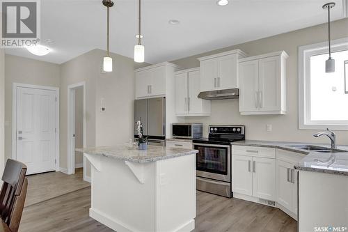 5389 Mckenna Crescent, Regina, SK - Indoor Photo Showing Kitchen With Double Sink With Upgraded Kitchen