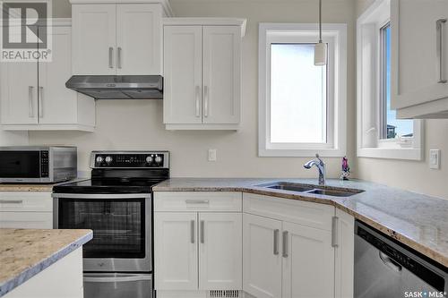 5389 Mckenna Crescent, Regina, SK - Indoor Photo Showing Kitchen With Double Sink