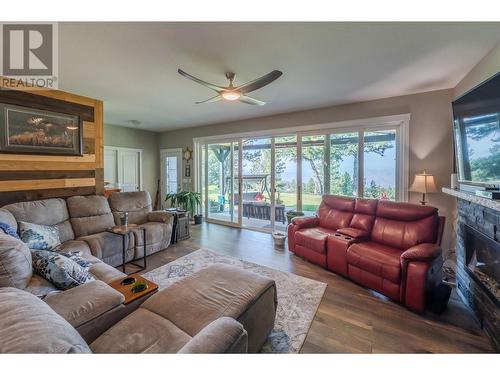 124 Sasquatch Trail, Osoyoos, BC - Indoor Photo Showing Living Room With Fireplace