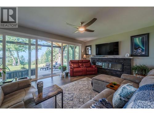 124 Sasquatch Trail, Osoyoos, BC - Indoor Photo Showing Living Room With Fireplace