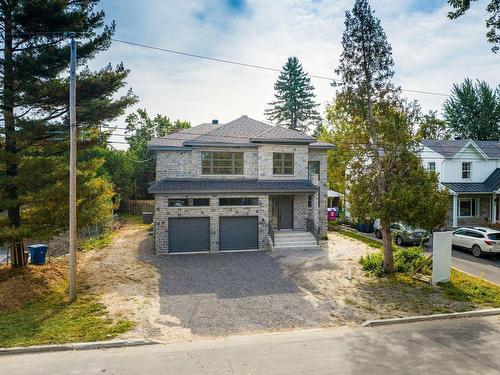 Exterior - 24A Rue De Lacey Green, Kirkland, QC - Outdoor With Facade