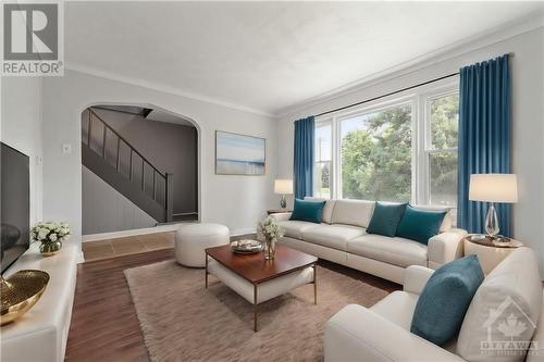 This photo has been virtually staged. - 3573 Navan Road, Ottawa, ON - Indoor Photo Showing Living Room