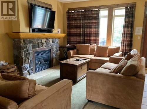 1351 Gerry Sorensen Way Unit# M3B, Kimberley, BC - Indoor Photo Showing Living Room With Fireplace