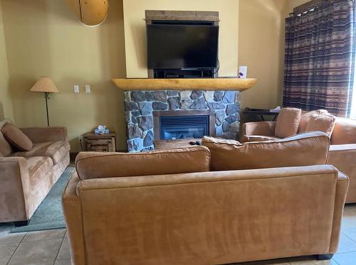 M3B - 1351 Gerry Sorensen Way, Kimberley, BC - Indoor Photo Showing Living Room With Fireplace