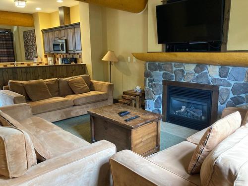 M3B - 1351 Gerry Sorensen Way, Kimberley, BC - Indoor Photo Showing Living Room With Fireplace