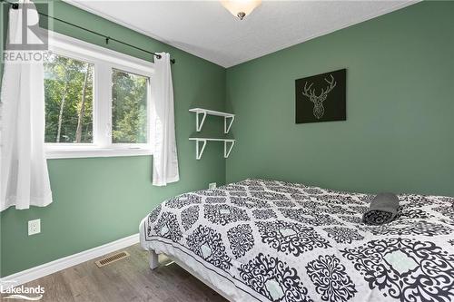 411 Shawanaga Lake Road, Dunchurch, ON - Indoor Photo Showing Bedroom